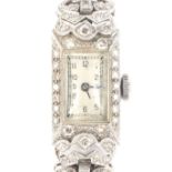 An early 20th century lady's white gold and diamond cocktail watch, circa 1935.