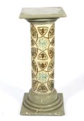A decorative painted and molded jardiniere stand.