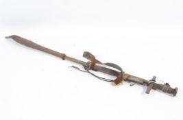 A Sudanese Kaskara sword with scabbard.