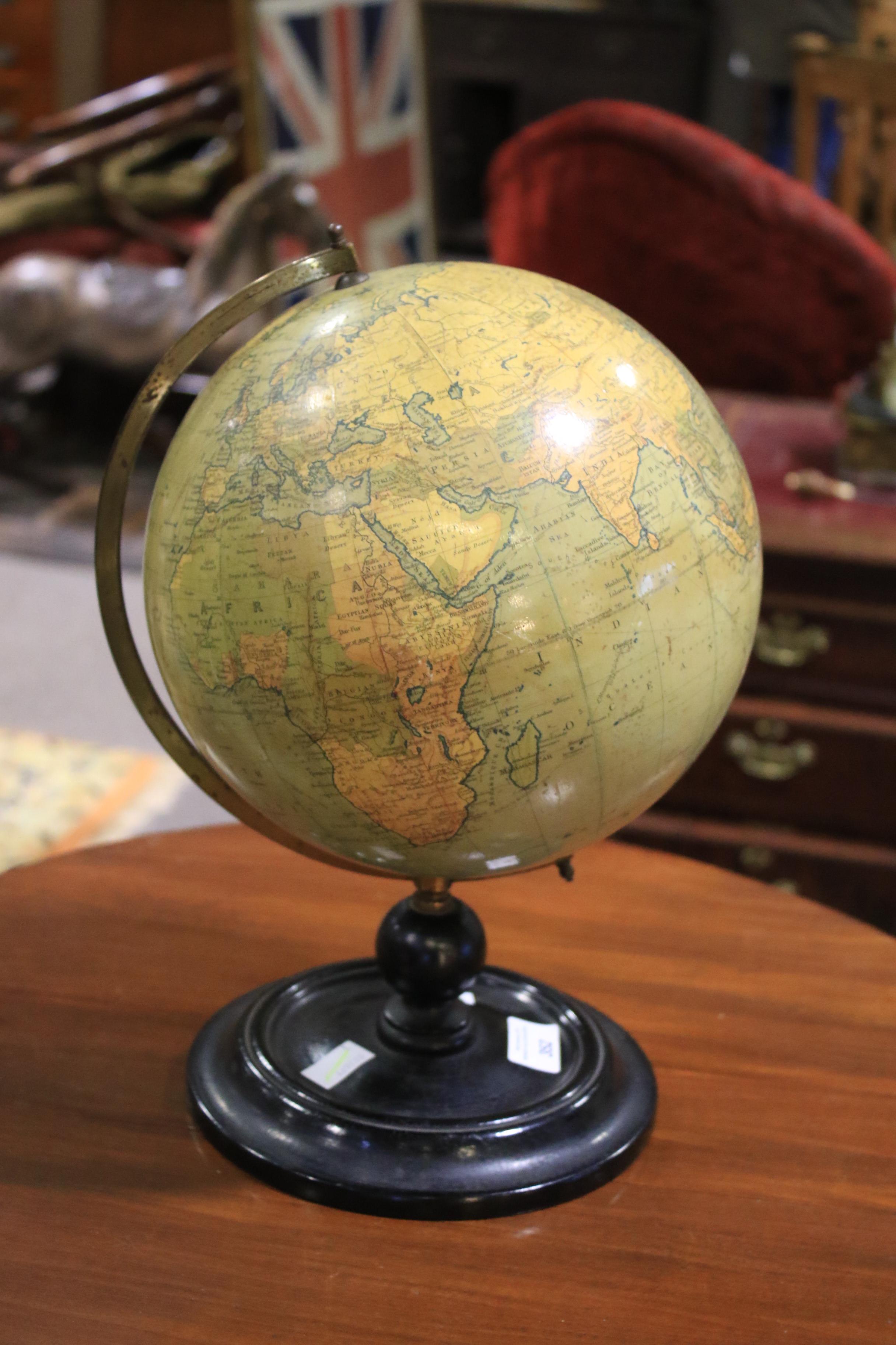 An early 20th century Philip's 9 inch terrestrial globe on ebonised stand. - Image 5 of 12