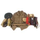 An assortment of military belts and other accessories.
