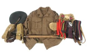An assortment of military belts and other accessories.
