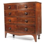 A Victorian mahogany bow fronted chest of drawers.