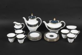 A Royal Doulton six setting Carlyle pattern tea set.