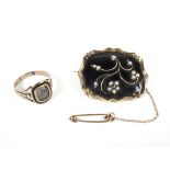 A Regency mourning ring and a brooch.