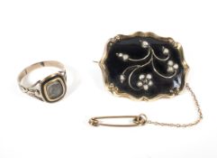 A Regency mourning ring and a brooch.