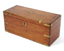 A mahogany brass mounted lidded box of rectangular form,with brass plaque to the lid,