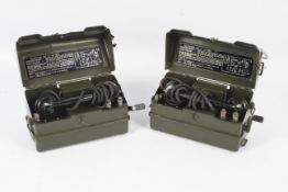 Two military field telephone sets "J" YA 7815 in original field cases.