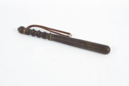 A late 19th century ebony police truncheon.
