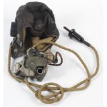 A WWII rear gunners flight helmet and microphone belonging to Ken Heppinstall.