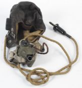 A WWII rear gunners flight helmet and microphone belonging to Ken Heppinstall.