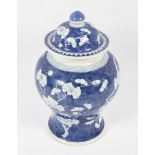 A 19th century Chinese blue and white bulbous jar and cover.