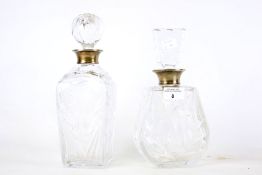 Two 20th century silver-necked decanters.