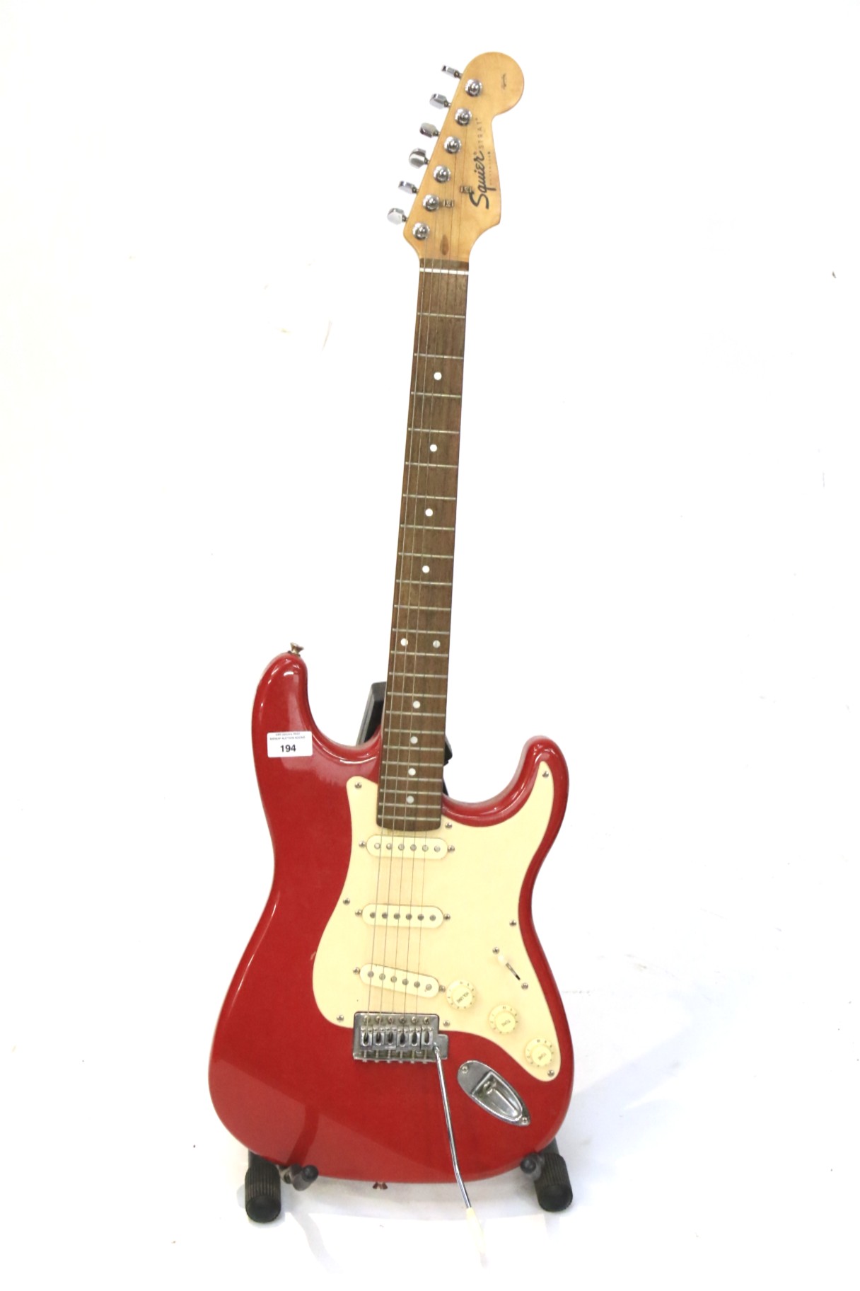 A Squier strat electric guitar by Fender.