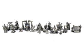A collection of Roger Gibbons pewter models.