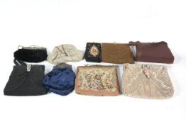 Nine vintage ladies handbags.