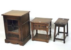 An oak side cabinet, a single drawer oak side table and an oak stool.