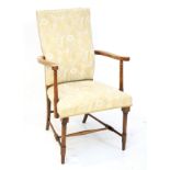 A 20th century mahogany armchair.