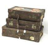 Three vintage travelling cases.