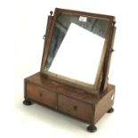 An Edwardian veneered dressing table mirror.