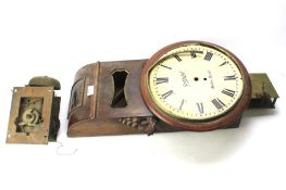 A 19th century mahogany cased wall clock and other related clock items.
