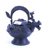 A 20th century Chinese style metal teapot.