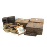 An assortment of wooden boxes and collectables.