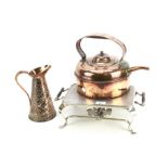 An early 20th century silver plated warmer stand with heater, a jug and a pot.