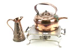 An early 20th century silver plated warmer stand with heater, a jug and a pot.