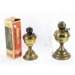 Two 20th century brass oil lamps.