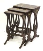 An early 20th century lacquered nest of tables and a floor-standing workbox.