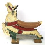 A painted and decorated fairground galloper horse.