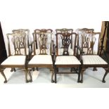 A set of six dining and two carver chairs.