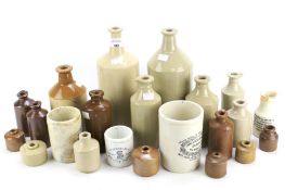 An assortment of saltglazed bottles, inkwells and similar items.