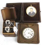 A boxed vintage scent bottle set, travelling clock and portrait miniature.