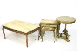A marble topped nest of tables, circular table and coffee table.