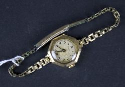 A 9ct gold cased ladies watch.