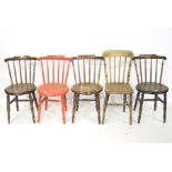 A set of four stained and painted kitchen chairs and an elm seated chair.