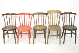 A set of four stained and painted kitchen chairs and an elm seated chair.
