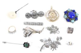 An assortment of silver, yellow metal and white metal jewellery.