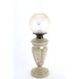 An early 20th century vaseline style glass oil lamp.