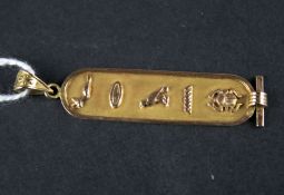 An Egyptian gold pendant. Decorated with traditional hieroglyphics, 2.