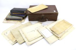 A vintage suitcase containing 1930s-1950s travel diaries.