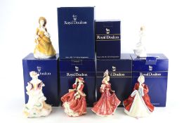 A collection of six Royal Doulton figures in original boxes.