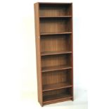 A contemporary wooden bookcase. With five shelves, L62.5cm x D28.