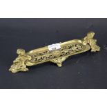 A Victorian brass pen tray.