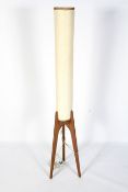 A 1960s tripod shaped rocket floor lamp.