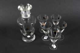A mid-century glass cocktail set.