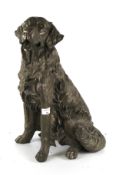 A resin model of a seated dog.