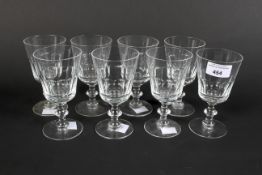 A set of eight wine glasses on baluster stems